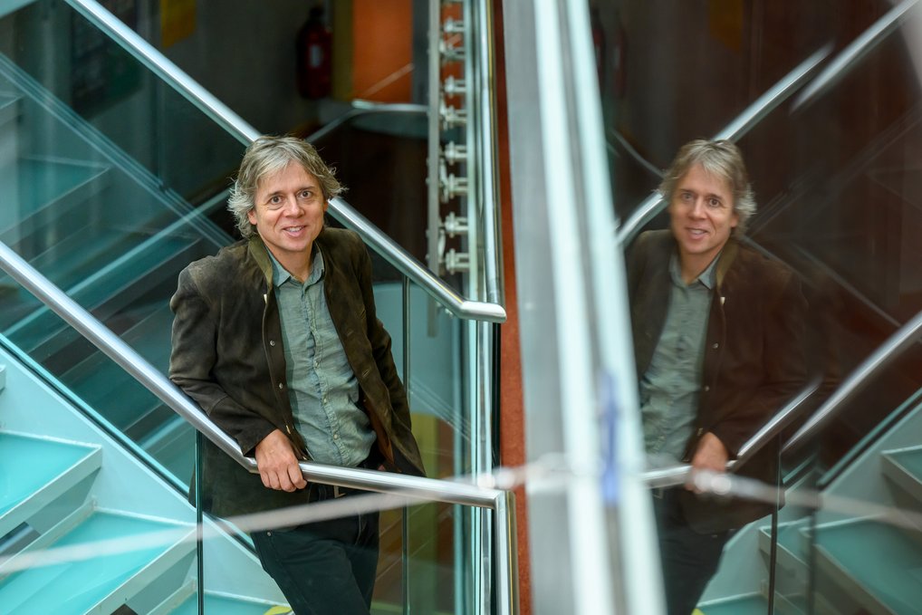 Bjorn Stevens standing on stairs