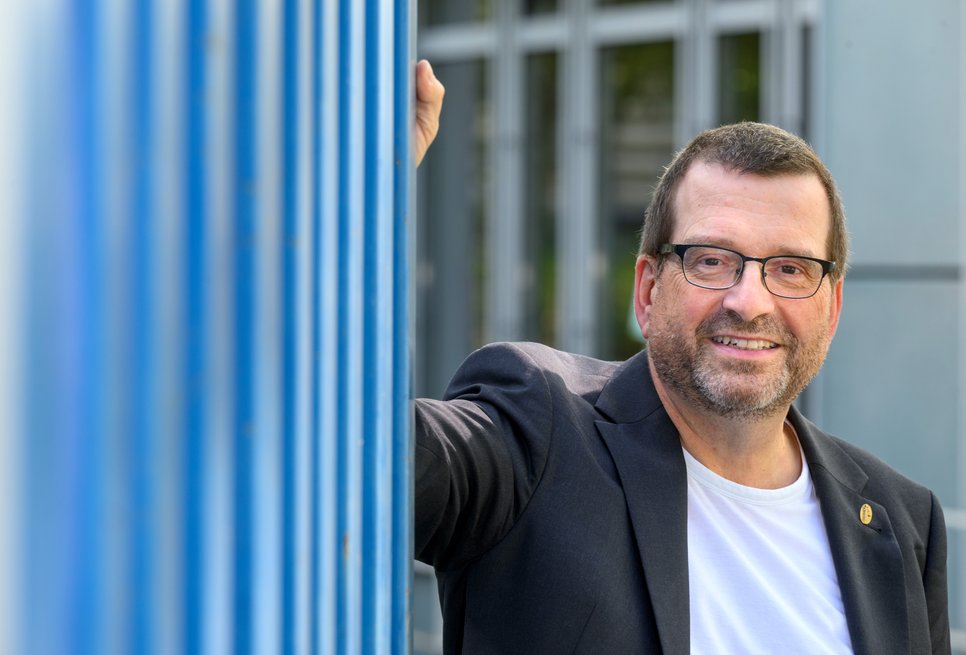 J Marotzke in front of the facade of the institute building
